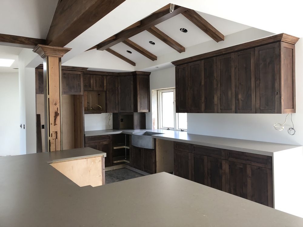 Cabinet and woodwork finishing project by J&M Custom Painting