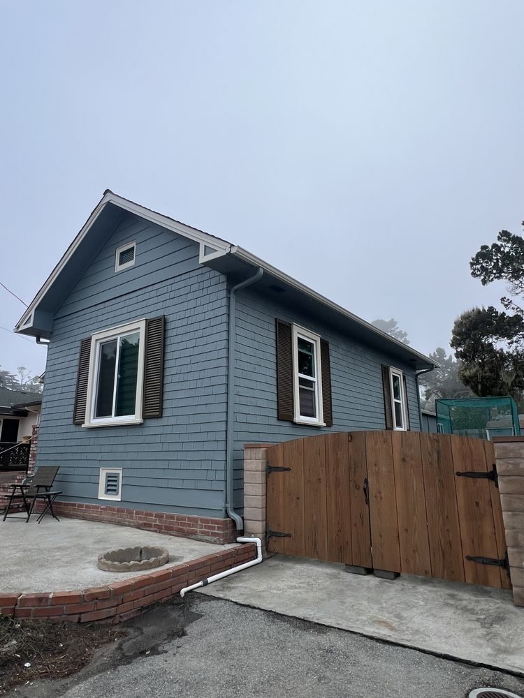 Blue cottage exterior painting in Castroville, California