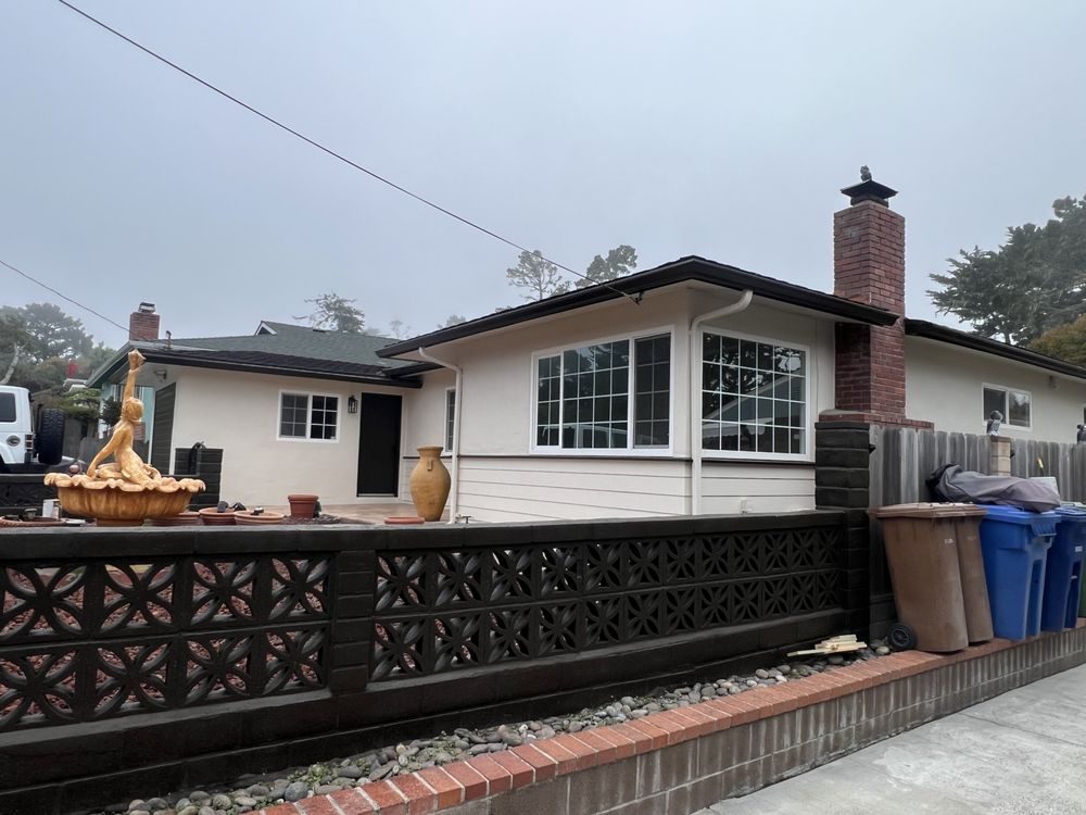 Ranch home exterior painting with brick detail in Monterey County