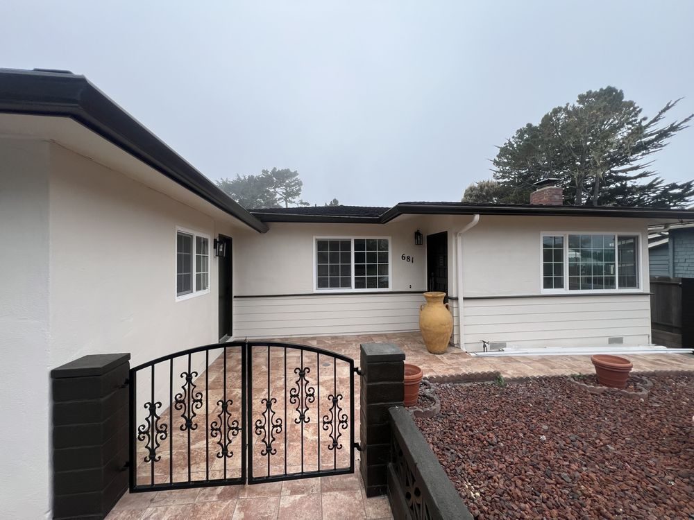 Exterior stucco and trim painting on a Monterey County home